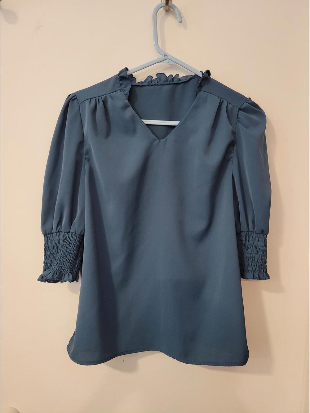 Blue V-Neck Blouse with Smocked Cuffs and Ruffle Collar